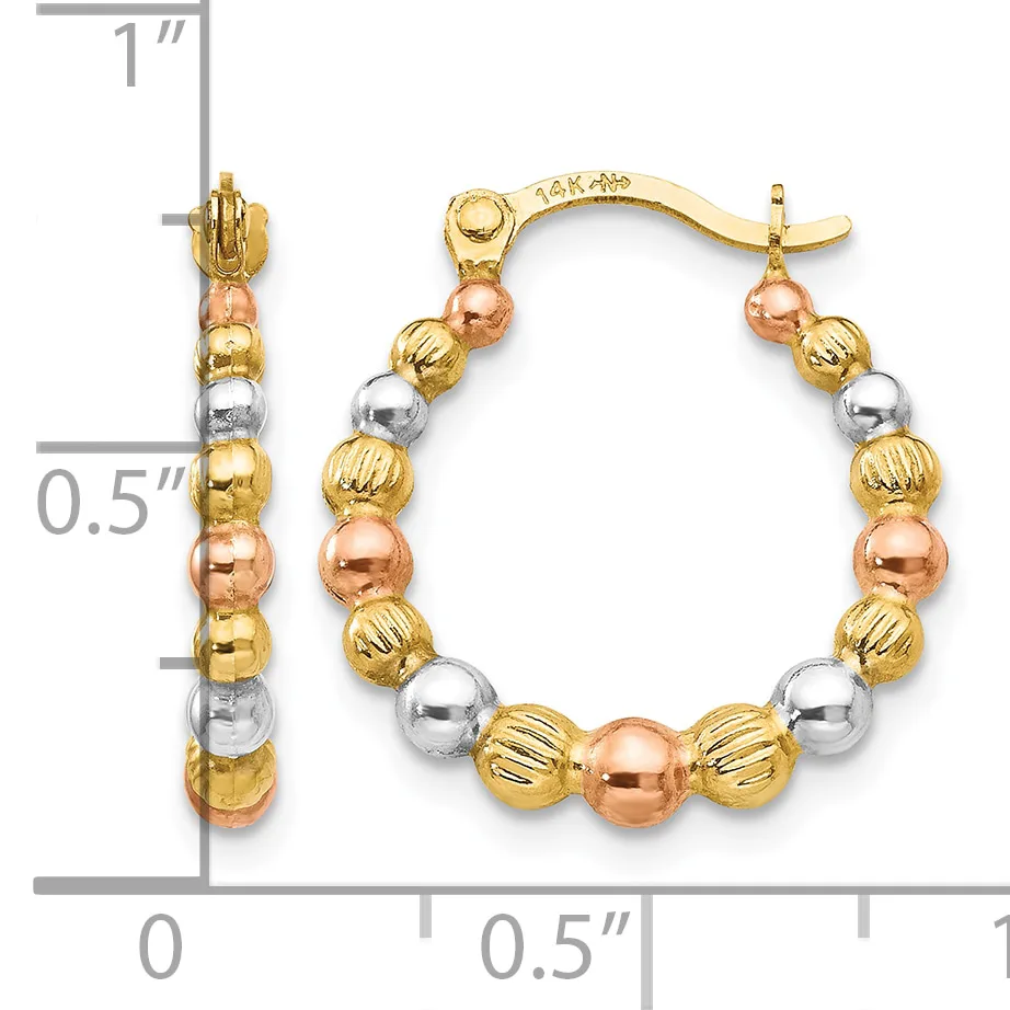 A pair of tri-color gold hoop earrings with alternating textured and smooth beads in yellow, white, and rose gold, shown with measurement scale indicating approximately one inch in length.