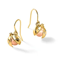 A pair of gold ladybug-shaped drop earrings with rose gold bodies and small diamond accents, displayed on a white background.