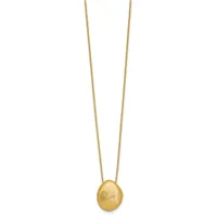 A gold spherical pendant hangs from a delicate gold chain against a white background.