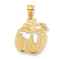 Gold pendant shaped like an apple with a stem and two leaves, featuring a detailed New York City skyline with skyscrapers inside the apple outline.