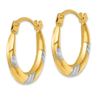 Pair of gold hoop earrings with white gold accents and hinged closures, displayed against a white background.