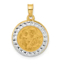 A two-tone gold pendant featuring a polished gold circular center with a relief of cherubs among flowering vines, surrounded by a white gold beaded border and suspended from a gold bail.