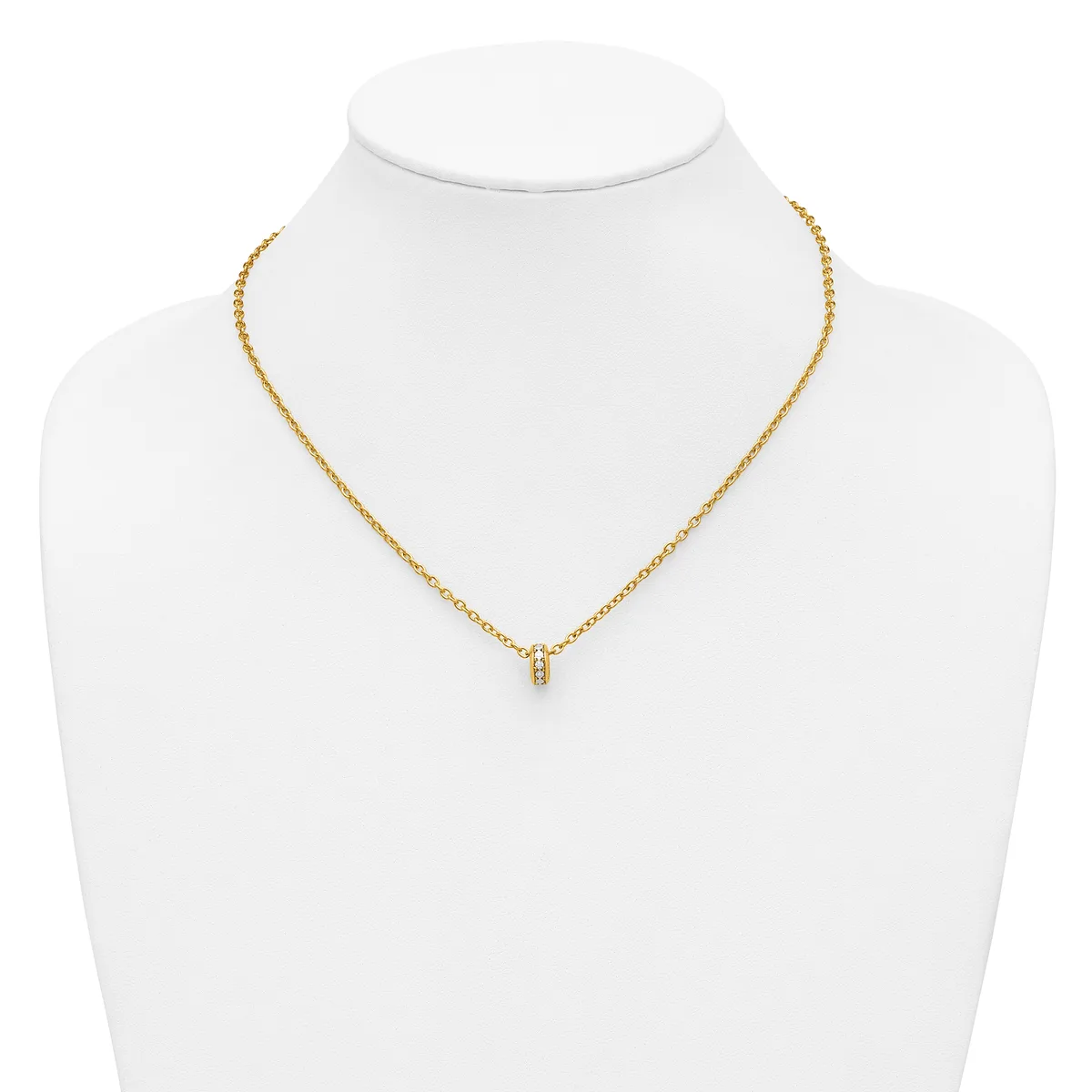 Gold-toned chain necklace with a small pendant featuring what appears to be a small diamond or gemstone, displayed on a white mannequin bust.