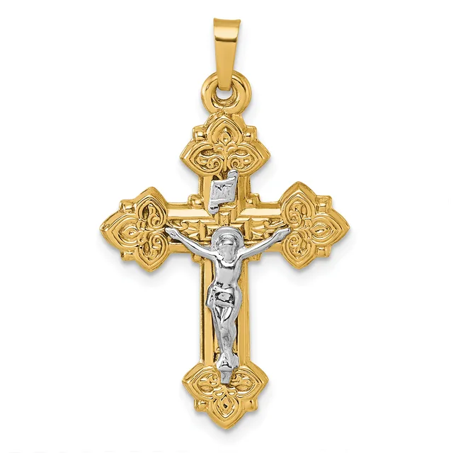 Two-tone gold crucifix pendant with ornate floral design at each of the four ends and a silver-colored corpus of Christ in the center.