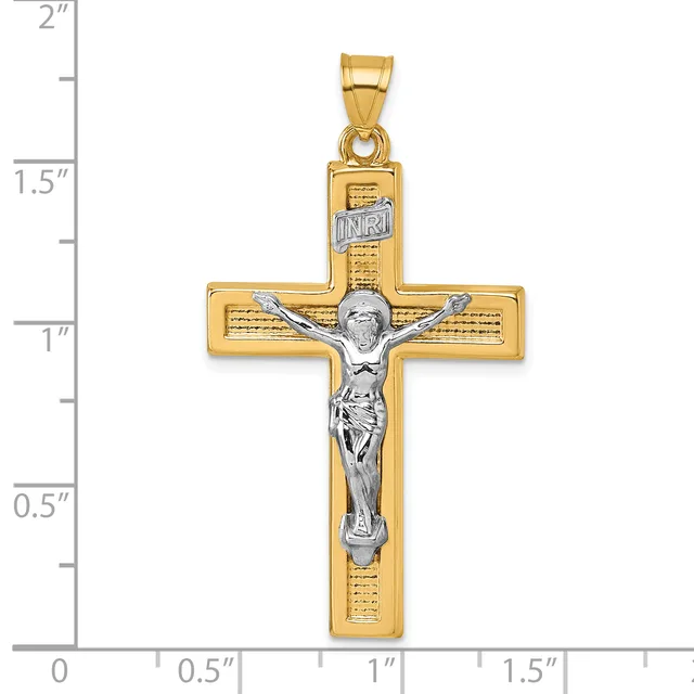 Two-tone gold crucifix pendant with textured gold cross and silver-toned corpus, shown against a ruler measuring approximately 1.9 inches tall.