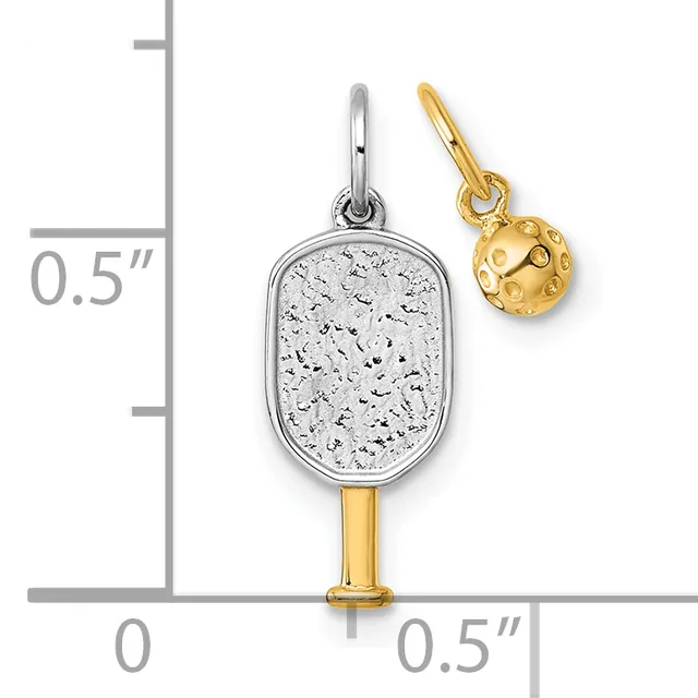 Two silver and gold paddle-shaped charms with textured surfaces displayed against a measurement scale showing approximately half an inch in height.