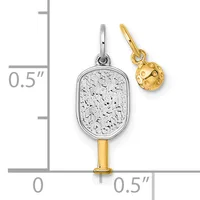 Two silver and gold paddle-shaped charms with textured surfaces displayed against a measurement scale showing approximately half an inch in height.