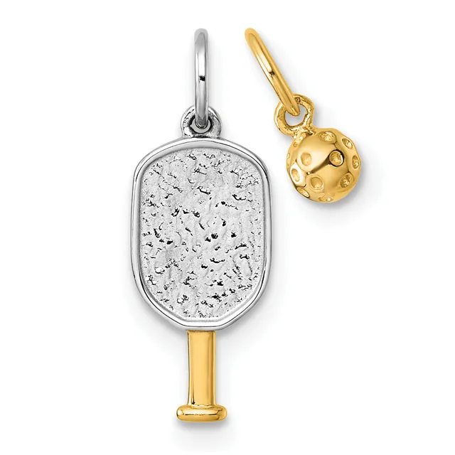 Two paddle-shaped charms with textured surfaces, one silver-toned with a speckled finish and gold-toned handle, the other smaller and gold-toned with a dimpled ball design.