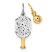 Two paddle-shaped charms with textured surfaces, one silver-toned with a speckled finish and gold-toned handle, the other smaller and gold-toned with a dimpled ball design.