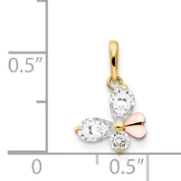 Gold pendant with three pear-shaped cubic zirconia stones arranged around a rose gold heart, shown next to a ruler indicating approximately half-inch dimensions.