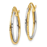 A pair of two-tone hoop earrings with yellow gold outer bands and white gold inner bands, shown from the front with hinged closures at the top.