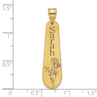 Gold-toned elongated pendant with "Sarah" engraved vertically and a floral design at the bottom, shown against a measurement scale.