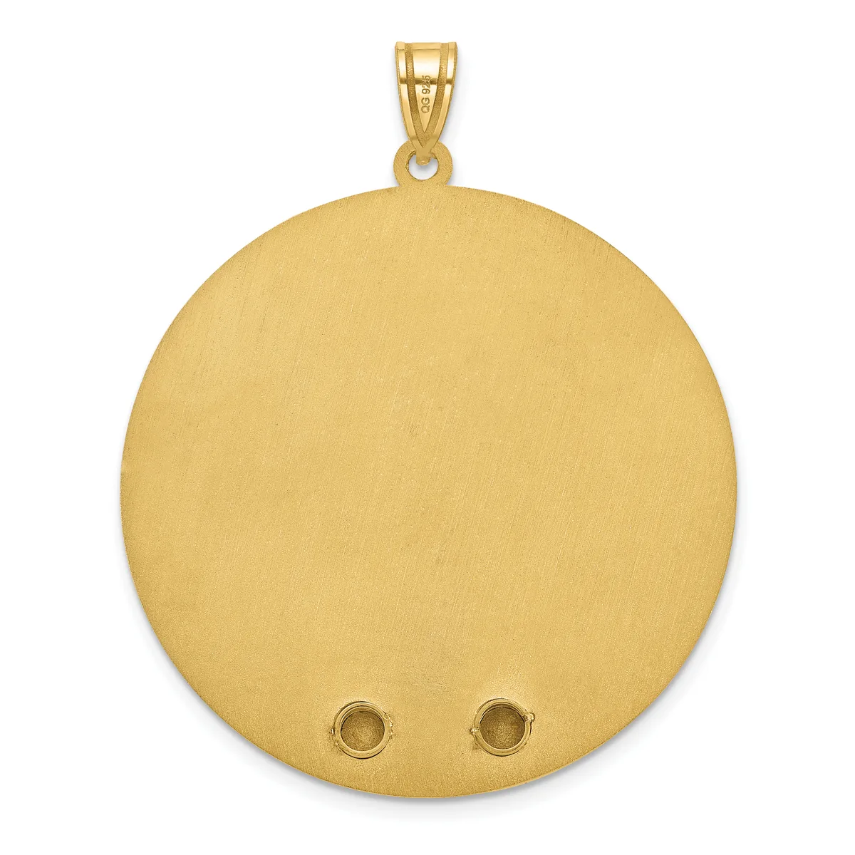 A large circular gold pendant with a brushed matte finish and two small round bezels near the bottom, suspended from a gold bail.