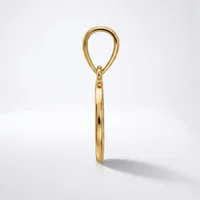 A gold pendant charm in the shape of a teardrop loop with a cylindrical bail, photographed against a white background.