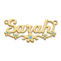 Gold-colored nameplate pendant spelling "Sarah" with decorative scrollwork and turquoise stones, featuring two loops at top for attachment.