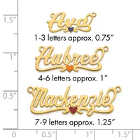 Three gold-colored name pendants with heart charms displayed against a ruler showing sizes ranging from approximately 0.75 to 1.25 inches in height.