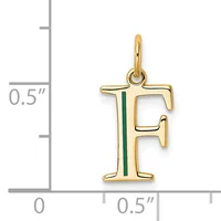 Gold-toned letter F pendant with green enamel stripe, shown next to a ruler indicating approximately half-inch dimensions.