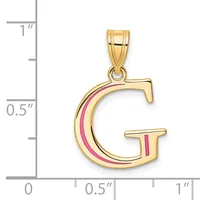 Gold letter G pendant with pink enamel stripe detail, shown next to a ruler for scale.