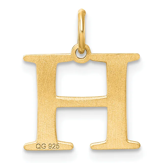 Gold letter H pendant with a polished bail at the top and a small stamped hallmark on the lower left side.