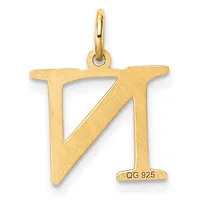 Gold pendant shaped like the letter N with a diagonal line through it, featuring a brushed finish and a small stamped hallmark on the lower right, suspended from a gold bail.