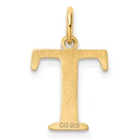 Gold pendant in the shape of the letter T with a textured finish and a small stamped hallmark on the base, suspended from a gold bail.