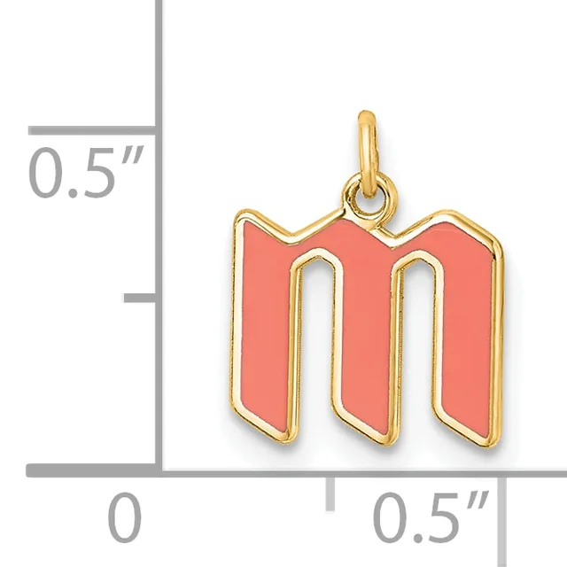 Coral enamel letter M pendant with gold-tone metal outline and loop, shown next to a ruler indicating approximately 0.5 inches in height and width.