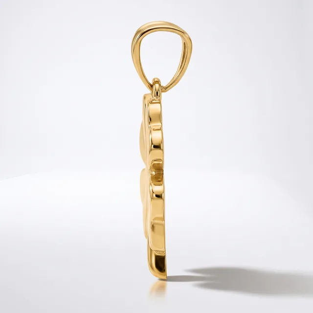 A polished gold pendant charm featuring a rectangular stone or crystal frame suspended from a bail loop, shown against a white background.