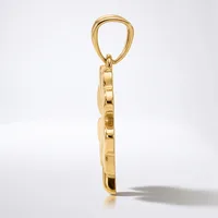 A polished gold pendant charm featuring a rectangular stone or crystal frame suspended from a bail loop, shown against a white background.