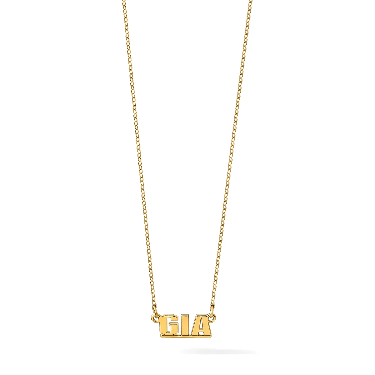 Gold necklace with a delicate chain holding a rectangular pendant with raised block letters spelling a three-letter name.