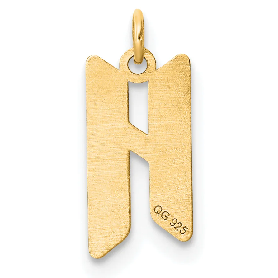 Gold letter H pendant with a brushed finish and a small stamped hallmark, suspended from a gold loop bail.
