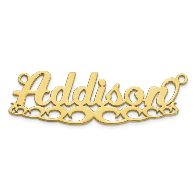 Gold-toned metal nameplate pendant with script lettering and decorative scrollwork base, featuring two small loops for attachment.