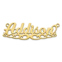 Gold-toned metal nameplate pendant with script lettering and decorative scrollwork base, featuring two small loops for attachment.