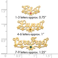 Three gold-colored decorative name plates with ornamental flourishes and gemstone centers, shown at actual size on a measurement scale indicating heights from approximately 0.75 to 1.25 inches.
