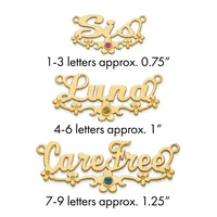 Three gold-colored ornamental name pendants with decorative flourishes and gemstone centers, ranging from approximately 0.75 to 1.25 inches in width.