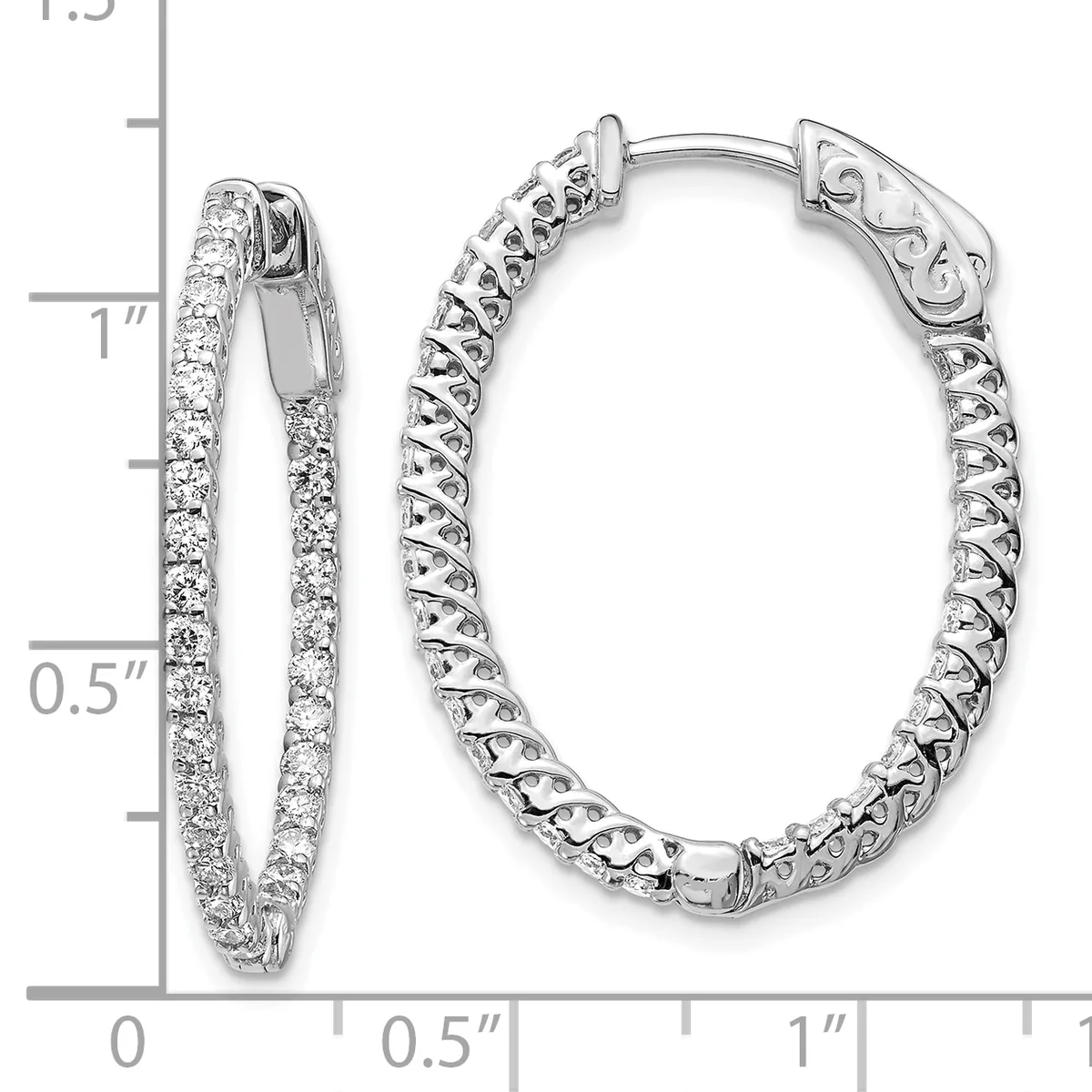 Two silver hoop earrings with hinged closures displayed against a measurement scale, one pair diamond-set and one with an ornate textured design.