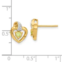 Two gold heart stud earrings with peridot gemstones and diamond accents, shown from front and side views next to a measurement scale.