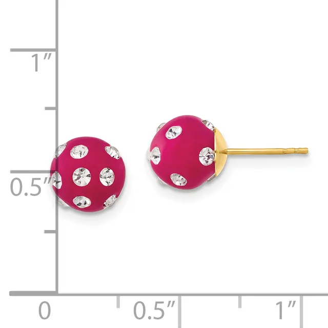 A pair of fuchsia enamel sphere stud earrings with crystal rhinestone accents and gold posts, shown next to a measurement scale.