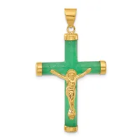 A gold crucifix pendant with a green jade or stone cross and gold-plated Jesus figure at the center, with gold caps at the four ends.