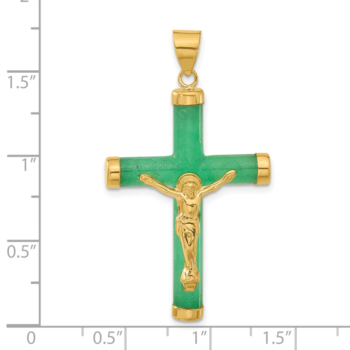 A green jade cross pendant with gold-tone metal caps at the ends and a gold-tone crucifix figure in the center, shown next to a ruler measuring approximately 1.5 inches tall.