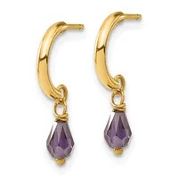 Pair of gold-colored curved hoop earrings with purple faceted teardrop gemstone dangles attached at the bottom.