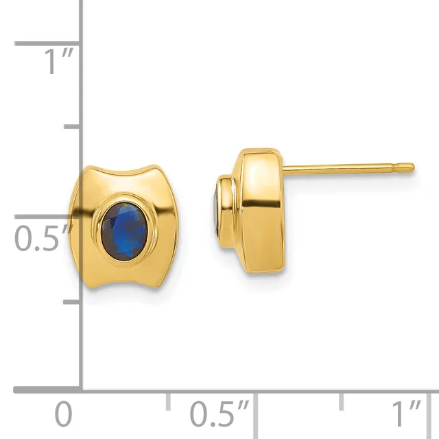 Gold stud earrings with oval blue gemstones set in curved rectangular frames, shown front and side view next to a measurement scale.