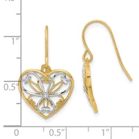 Two-tone gold heart-shaped earrings with filigree design and fish hook closures, displayed next to a ruler showing approximately one inch in length.
