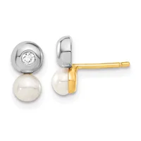 Pair of stud earrings featuring white pearls topped with silver bezels set with round white diamonds, shown from front and side views on gold posts.