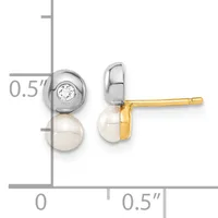 Two-tone stud earrings with a freshwater pearl below a round diamond in a bezel setting, shown front and side view with a measurement scale indicating 0.5 inch height.
