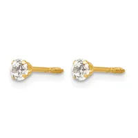 Pair of gold stud earrings with round clear gemstones in prong settings and textured posts.