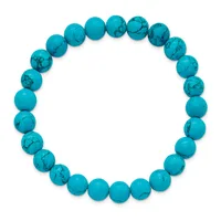 A beaded bracelet made of turquoise spheres with black veining, arranged in a circle against a white background.