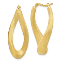 A pair of gold hoop earrings with a brushed matte finish and curved oval shape, shown from the front and side views.