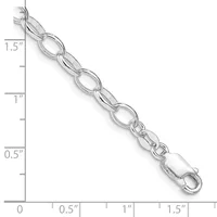 Silver-toned chain bracelet with oval and figure-eight links displayed against a ruler showing approximately 1.5 inches in length.