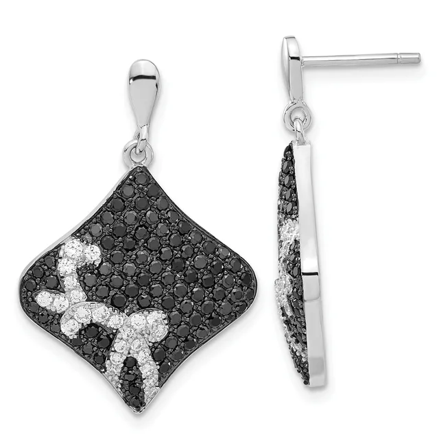 Pair of silver drop earrings with diamond-shaped pendants featuring black and white gemstones in a pave pattern, shown from front and side views.