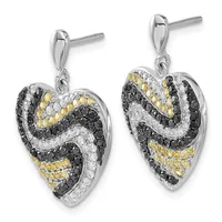 A pair of heart-shaped drop earrings with black, white, and yellow gemstones in a swirled pattern, suspended from silver posts.